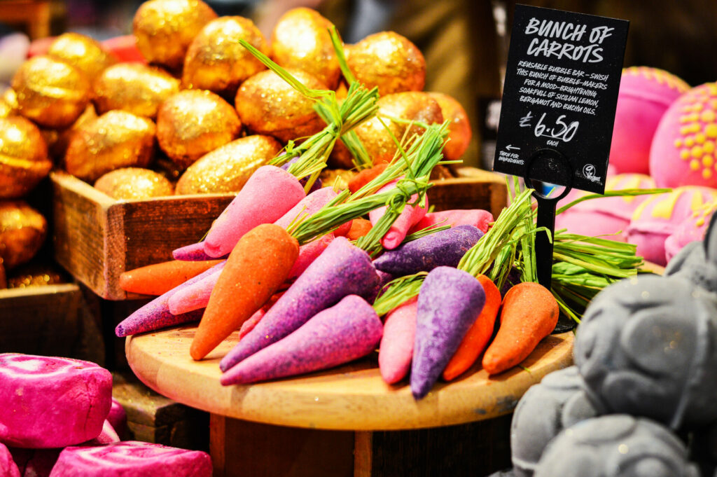 carrot soaps on display in a Lush store