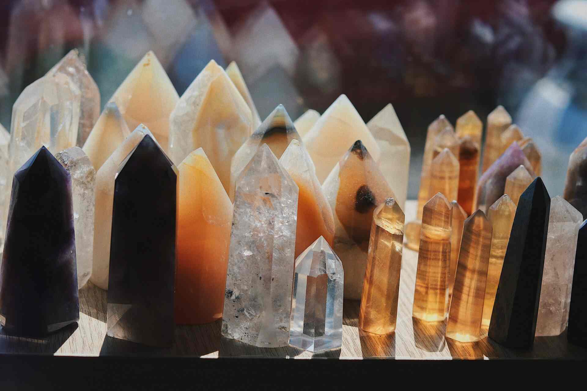 pointed crystals in shades of orange and brown huddled togethert