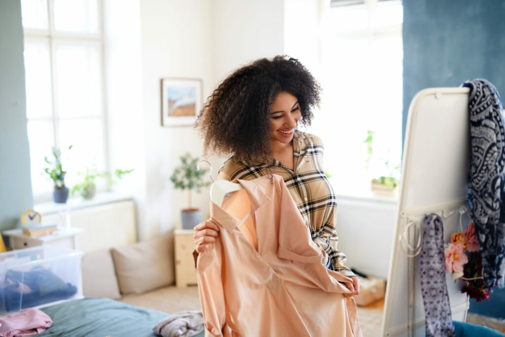 woman trying on clothes at home