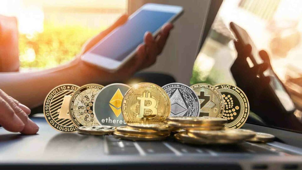 lady holding phone with cryptocurrency coins in front of her