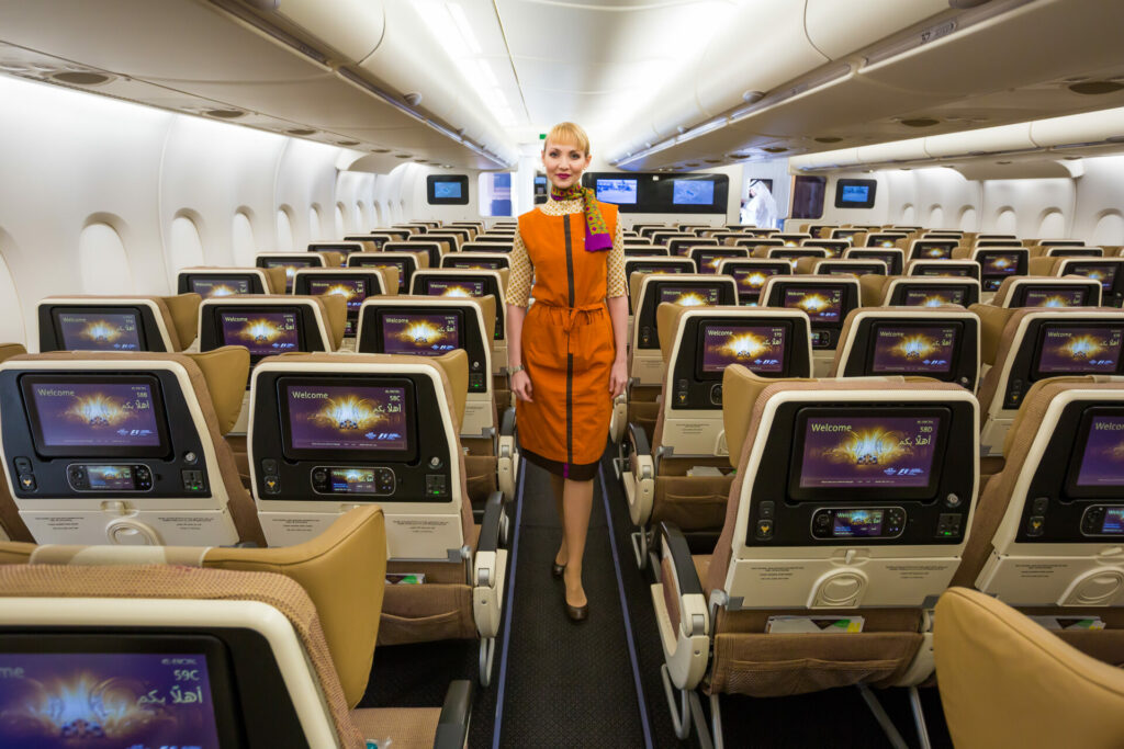 woman inside an Etihad plane in 2017