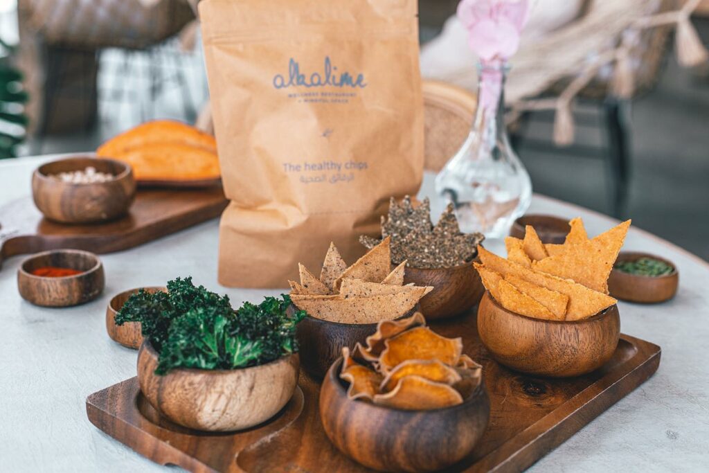 plant-based restaurant Alkalime serving corn chips in wooden bowls