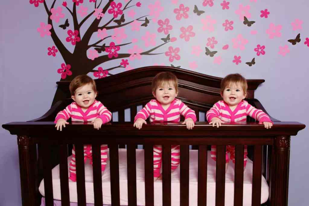 Triplets can soon learn that sharing a bed is caring for the environment