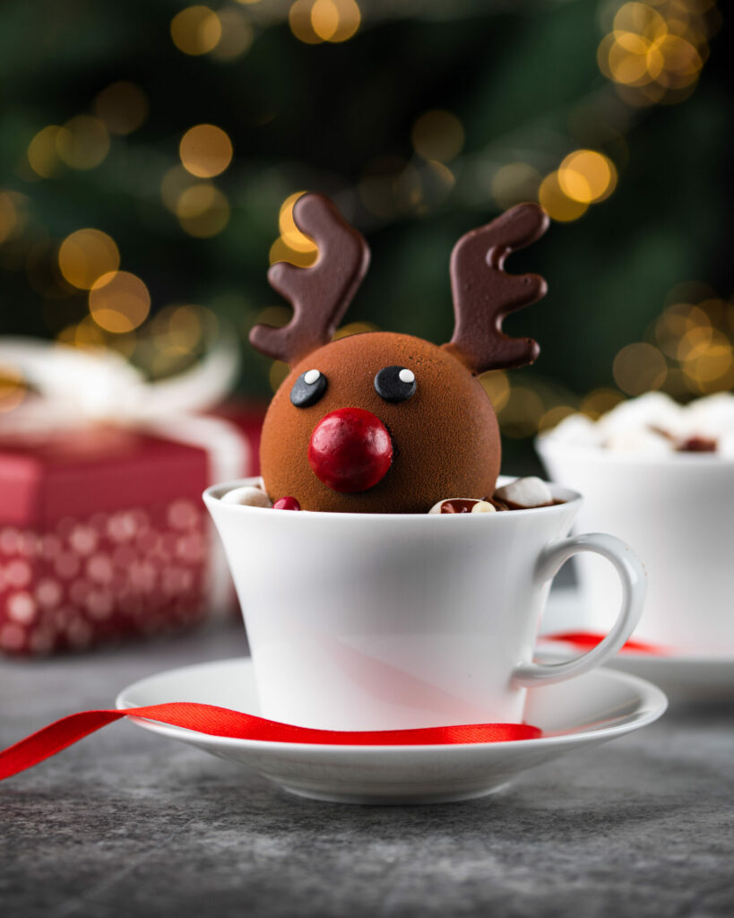 vegan chocolate bomb as reindeer in cup