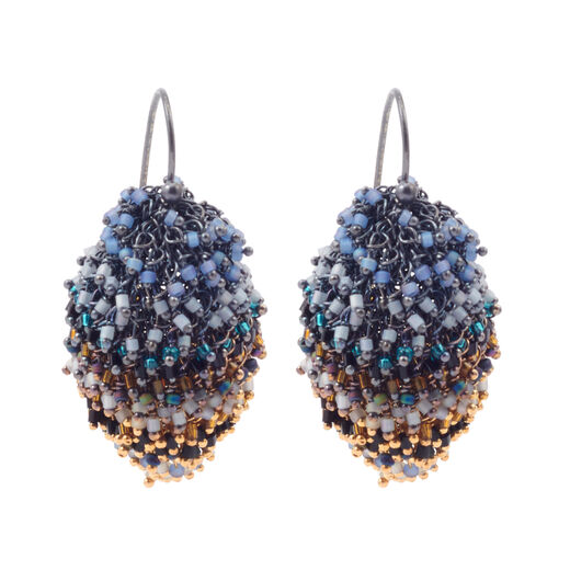 Indonesian artists create these intricate earrings