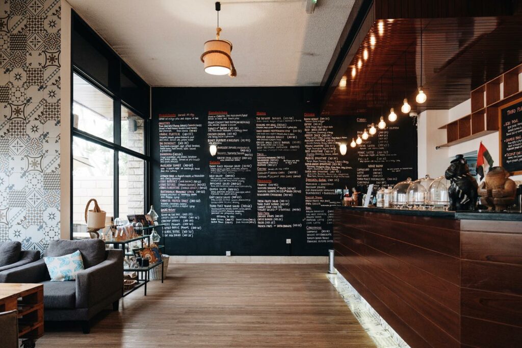 floor to ceiling blackboard with menu written in chalk 