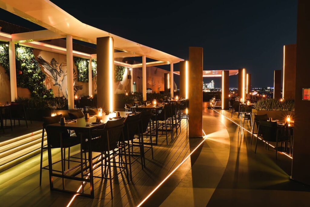 Night time view of outdoor restaurant terrace 