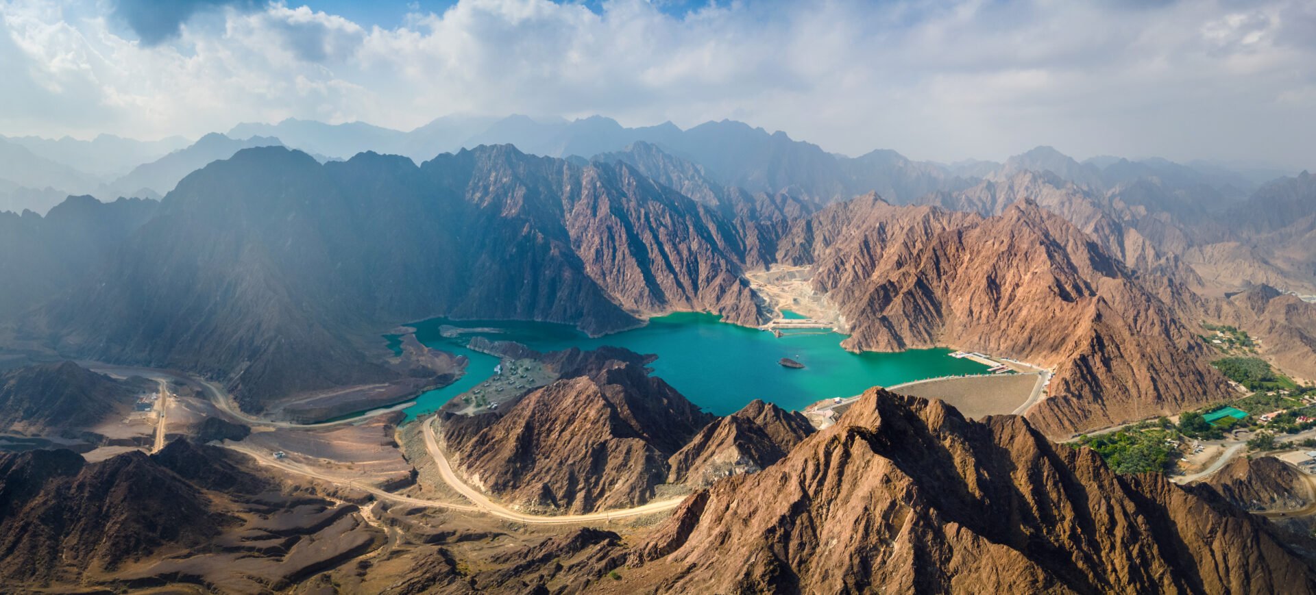 hatta dam surrounded by breathtaking mountains 