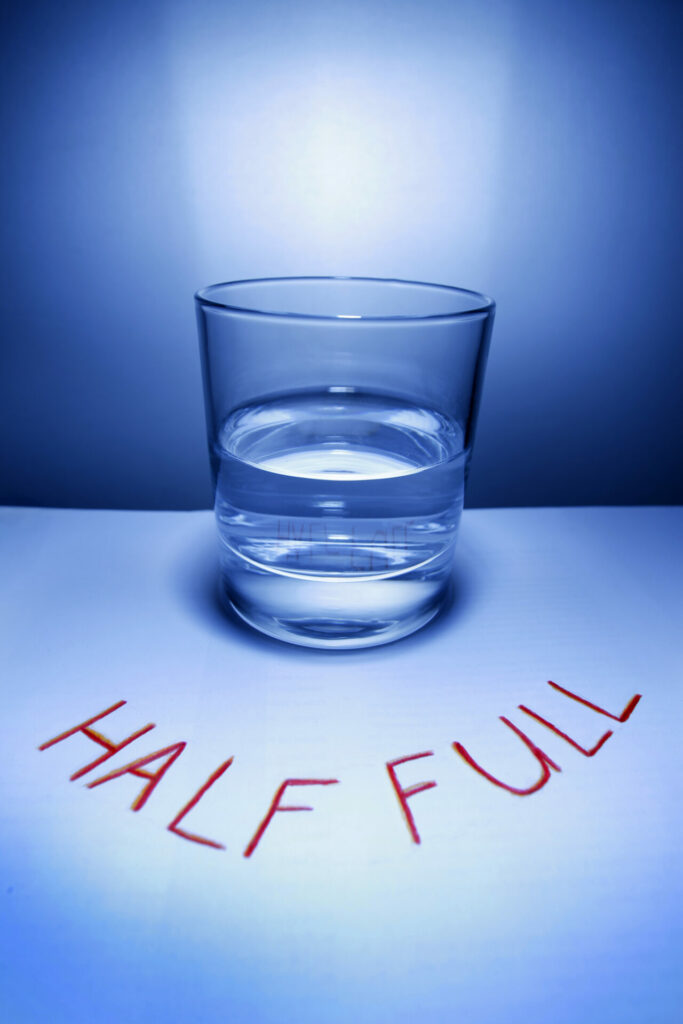 optimists see half full glass
