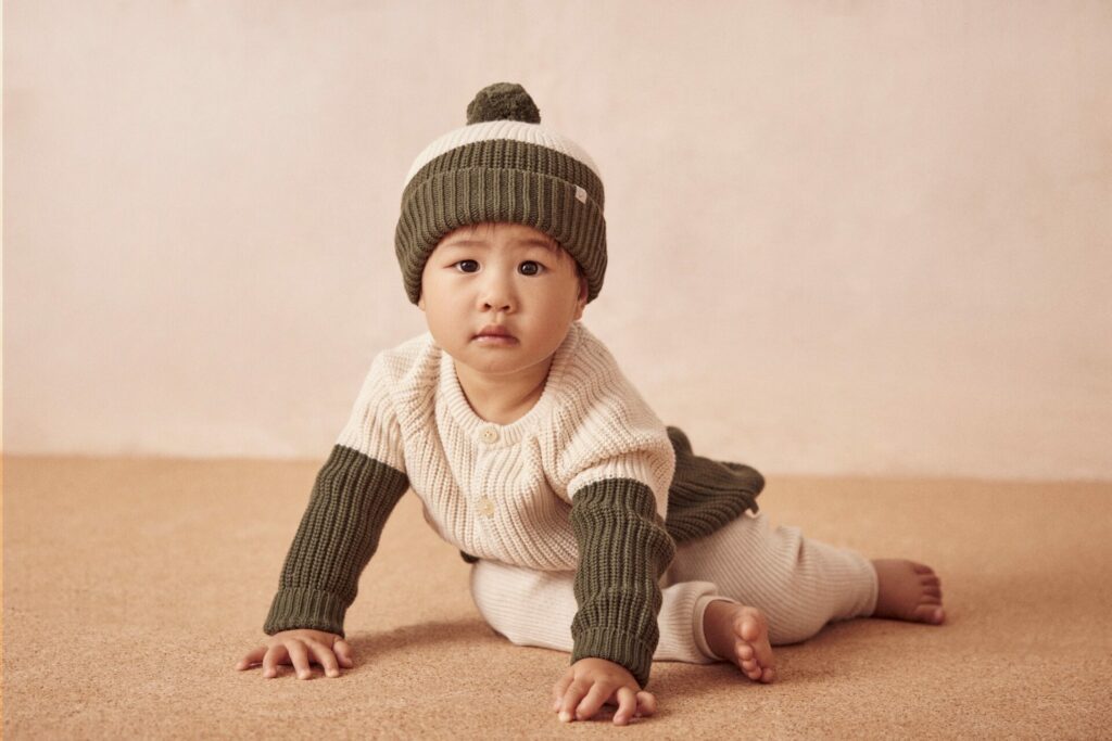 little boy in cute winter kids' clothing