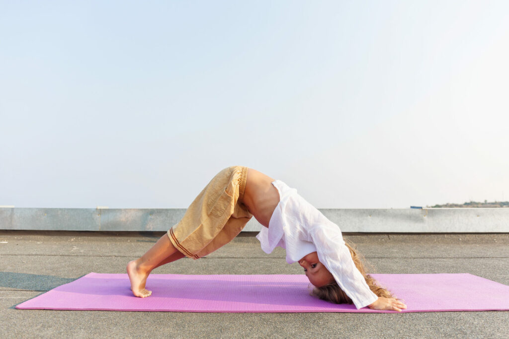 young girl in a yoga pose 