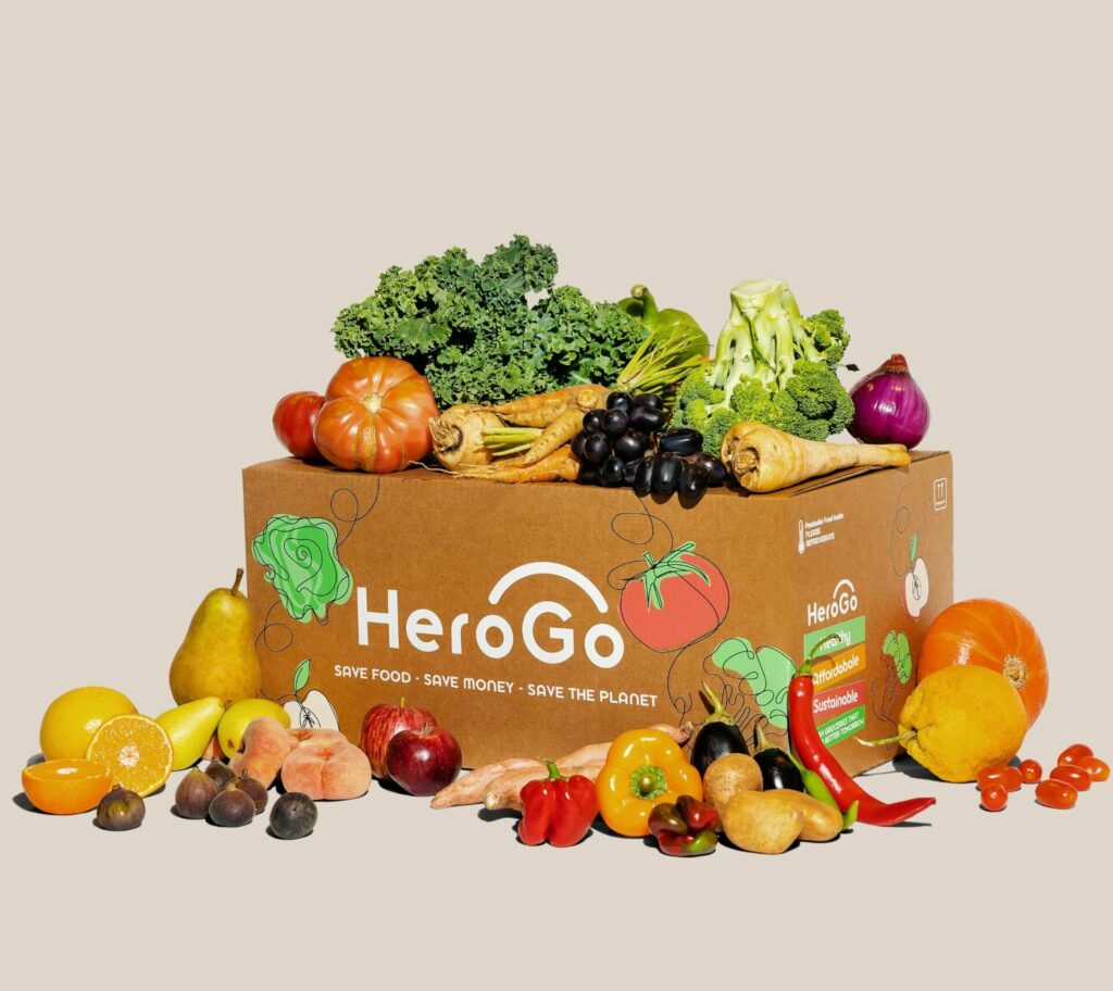 HeroGo box with fruits and veg scattered around 