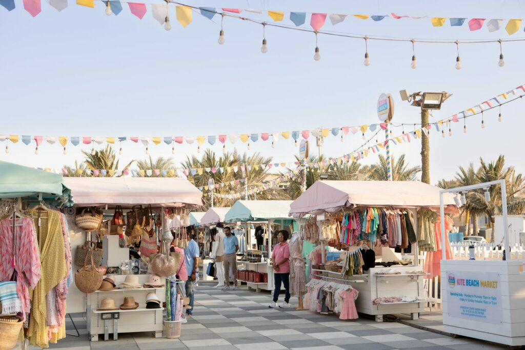 pretty bunting in pastel colours at an outdoor market 