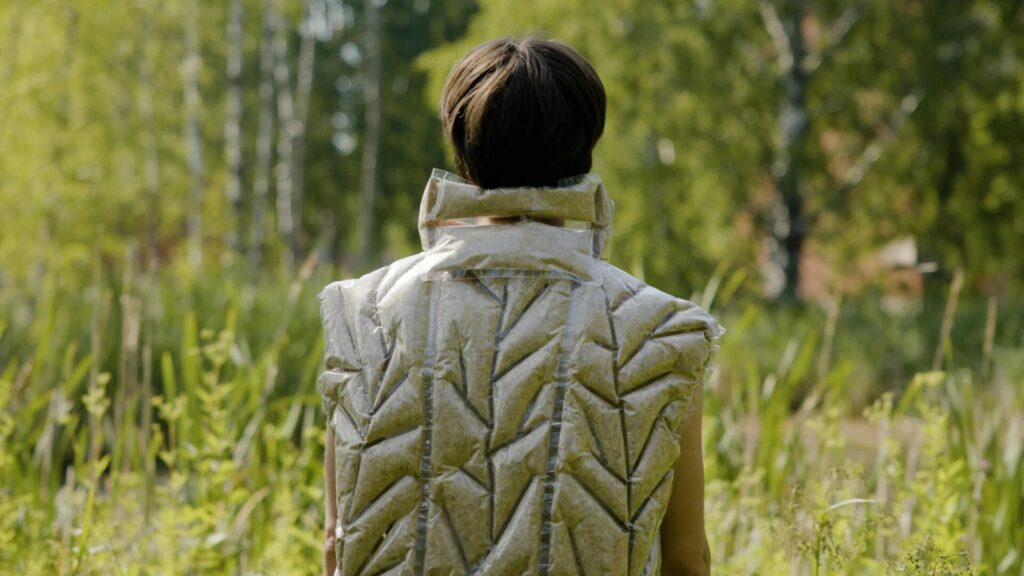 plant-based fashion shown in a see through jacket filled with plant derived textiles 