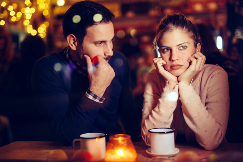 couple not talking at restaurant 