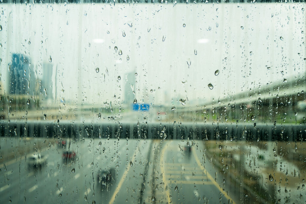 rain in Dubai after cloud seeding. Rain drops on window