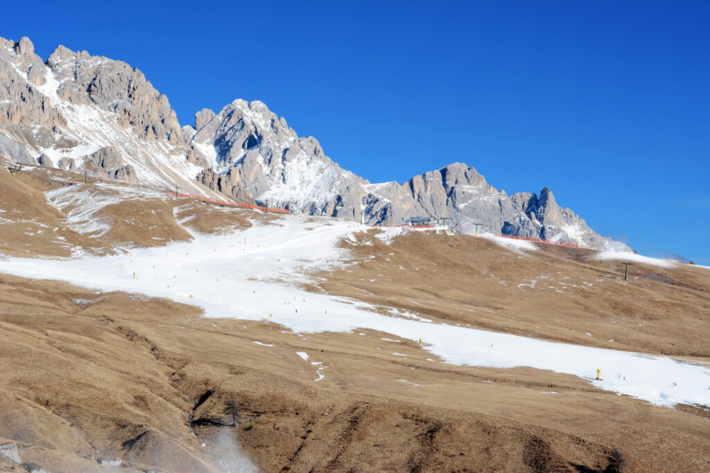 Ski slope in Dolomites, Italy showing decline in alpine snow 