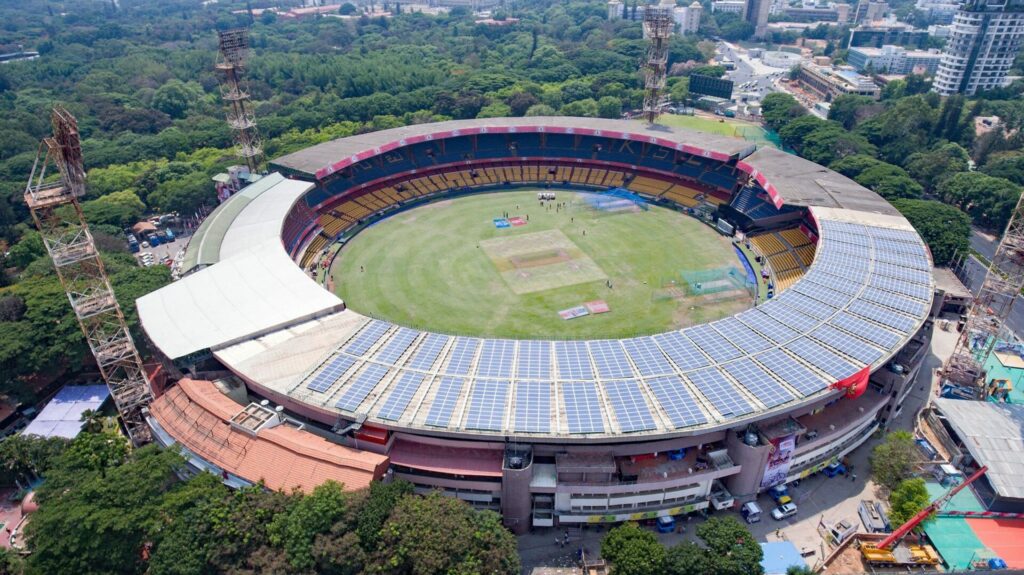 aerial view of IPL cricket stadium powered by solar panels 