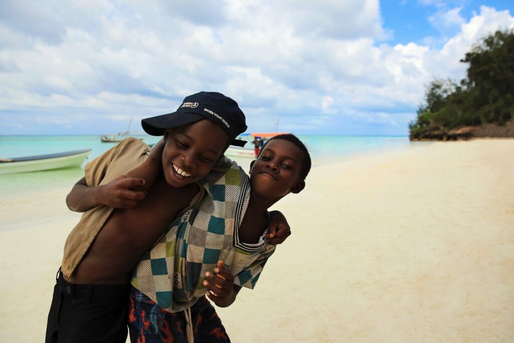 voluntourism with two kids on beach 