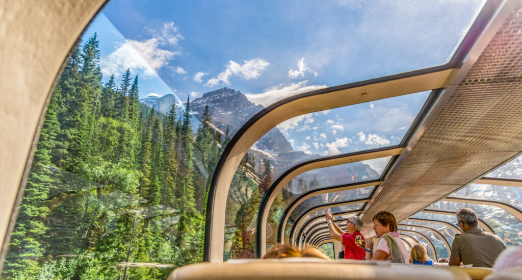 all aboard the rocky mountaineer heading through canada 