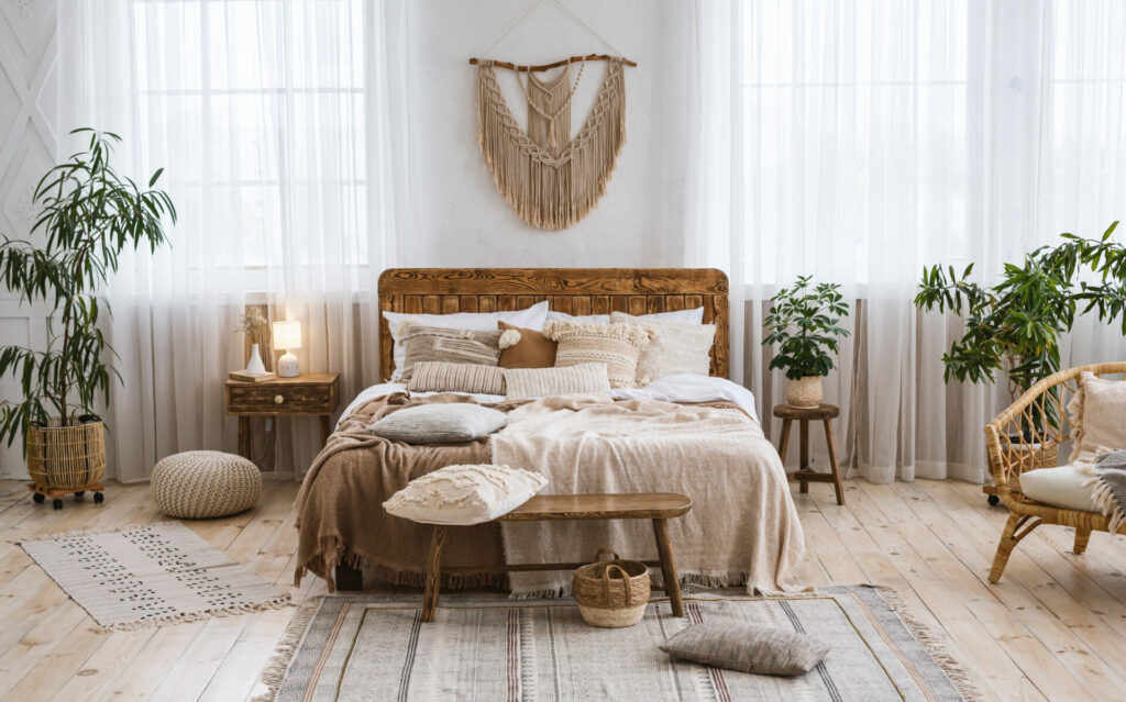 beautiful bedroom in neutral shades with plants 