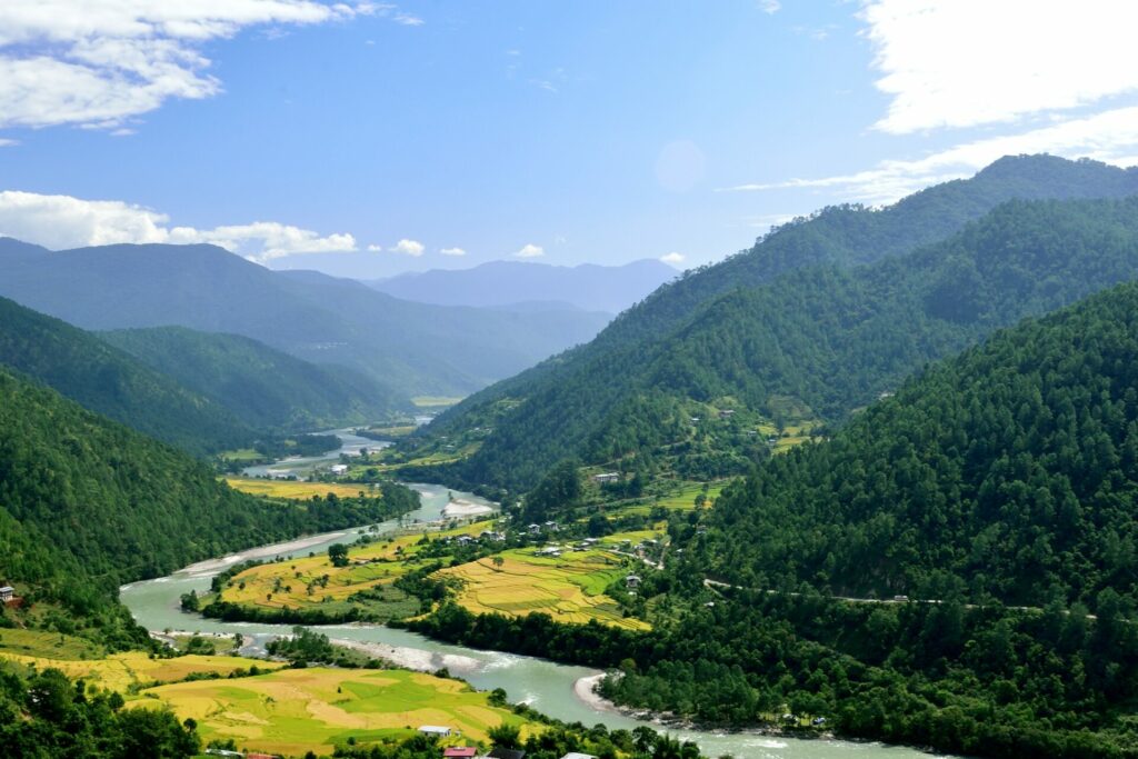 green valley with winding river 