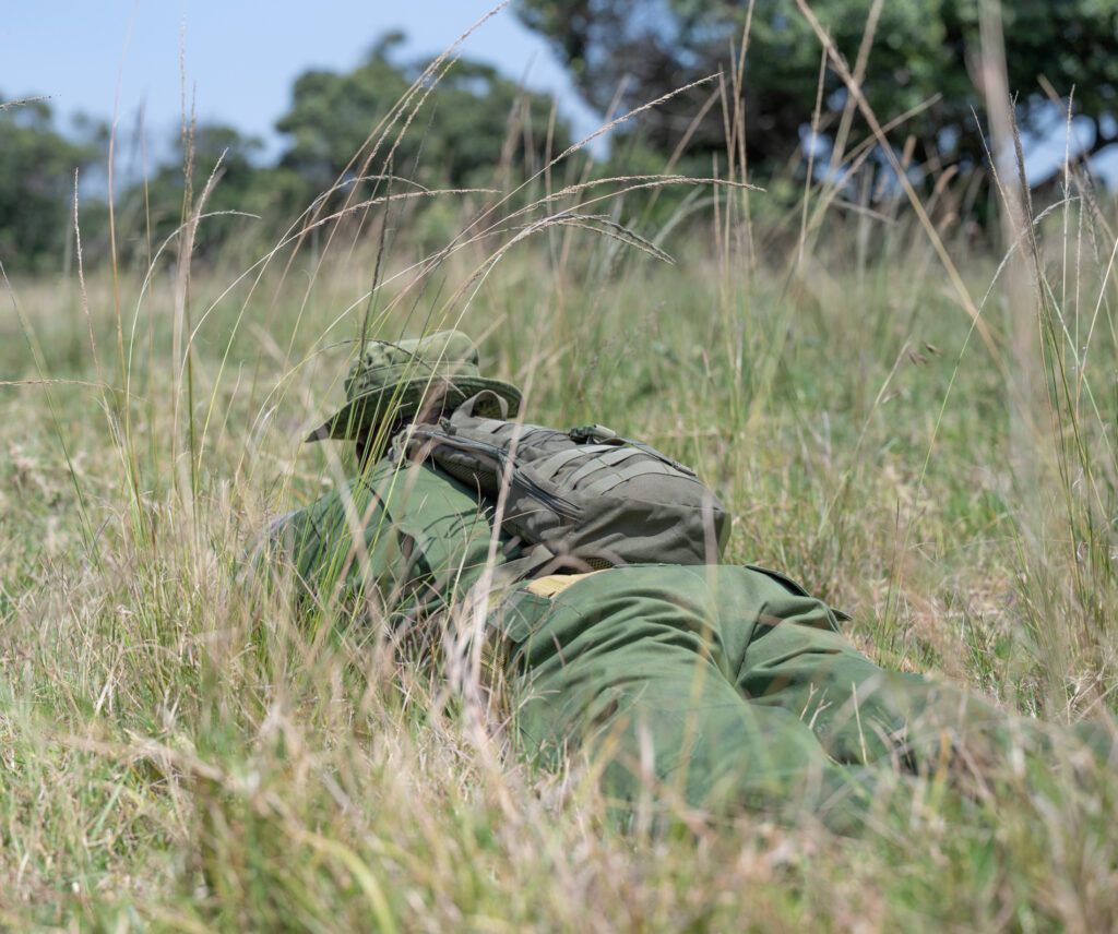 ranger crouched on the ground 