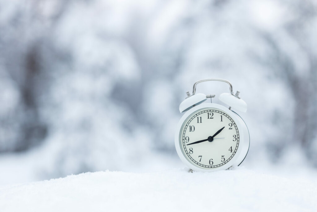 clock in snow 
