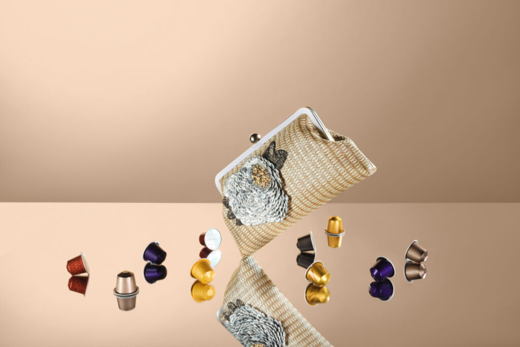 New collaborative handbag with Nespresso coffee capsules around it