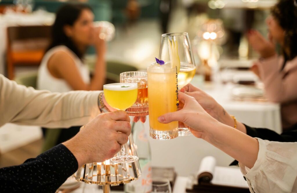 People with drinks at folly brasserie