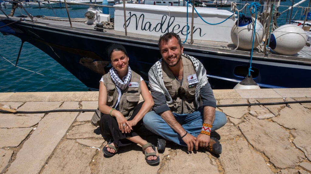 Rima Hassan sits in front of the Madleen