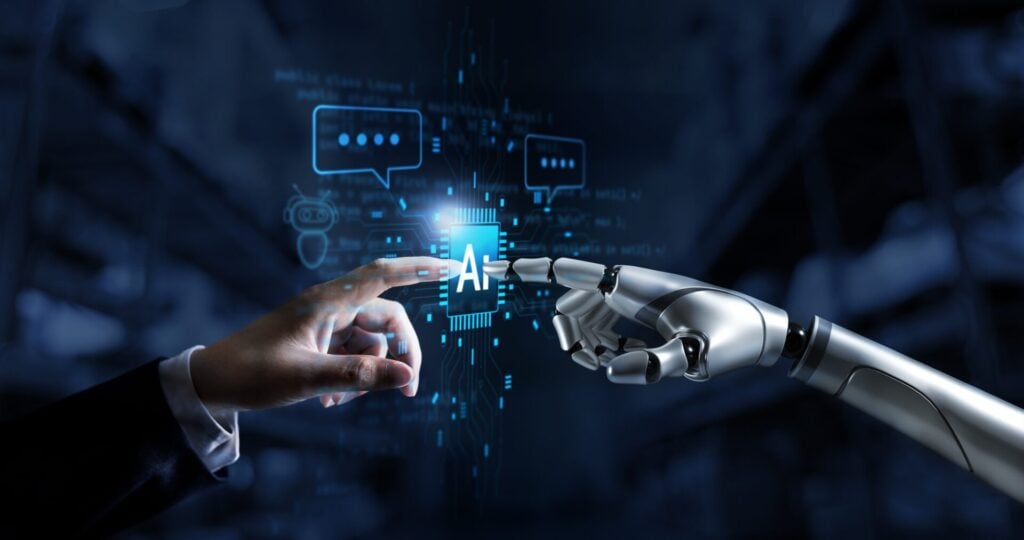 man's hand and human hand touching fingertips 