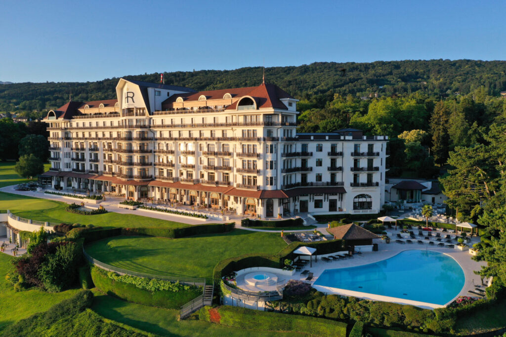 Hotel Royal with forest behind it