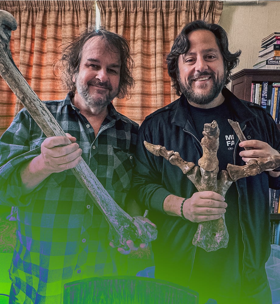 Peter Jackson holding Moa bones 