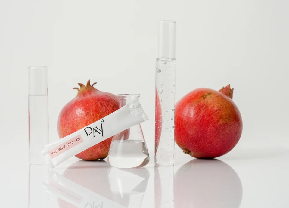Pomegranates with scientific glassware elements