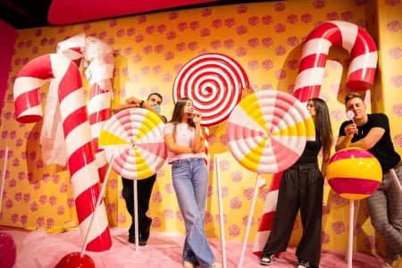 Colorful candy-themed photo backdrop scene.