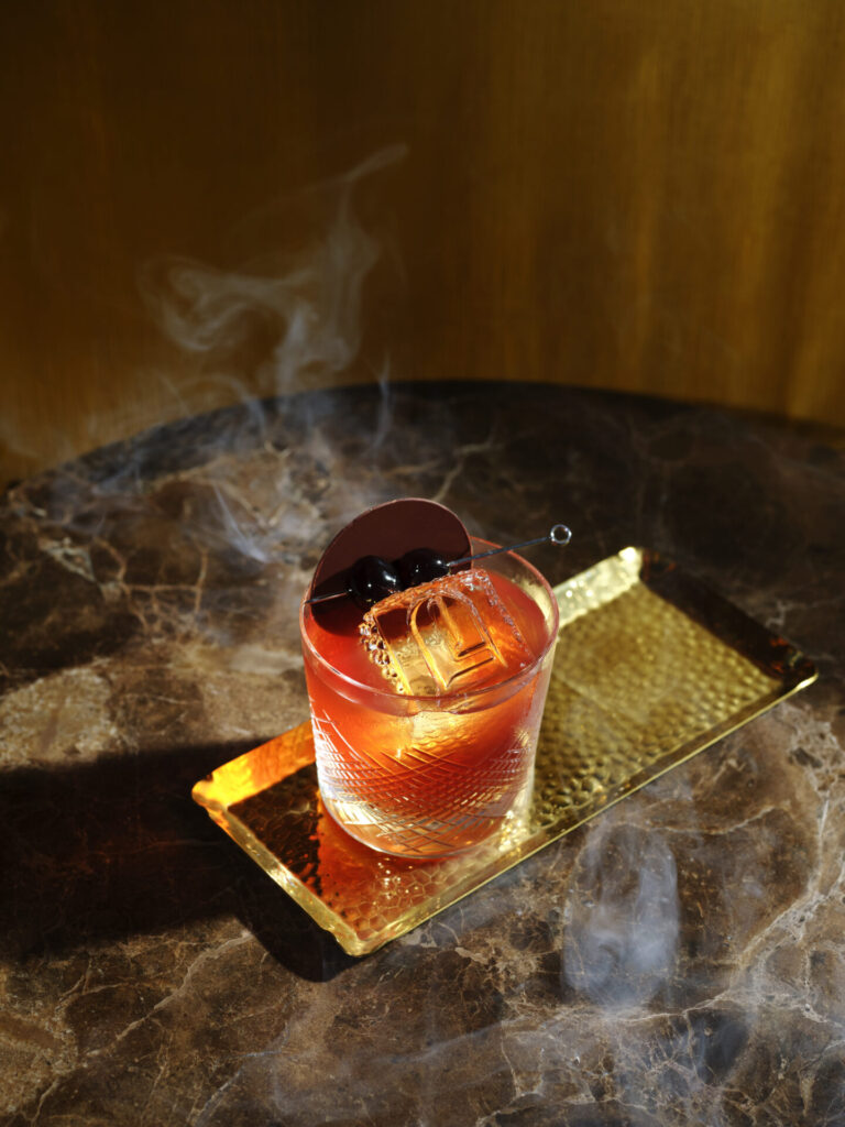 a negroni on a table for negroni month at the Lana 