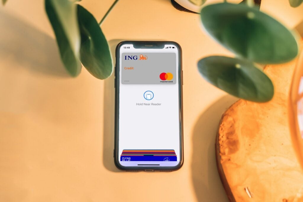 a cellphone with bank cards on the screen depicting smart automation in finance 