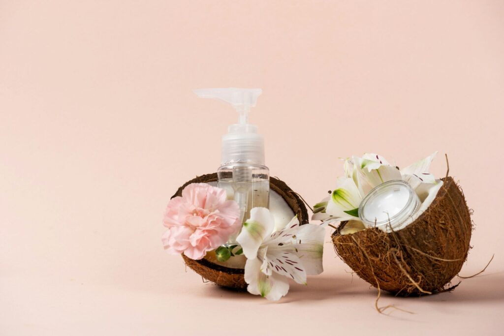 Coconut shells with flowers and skincare