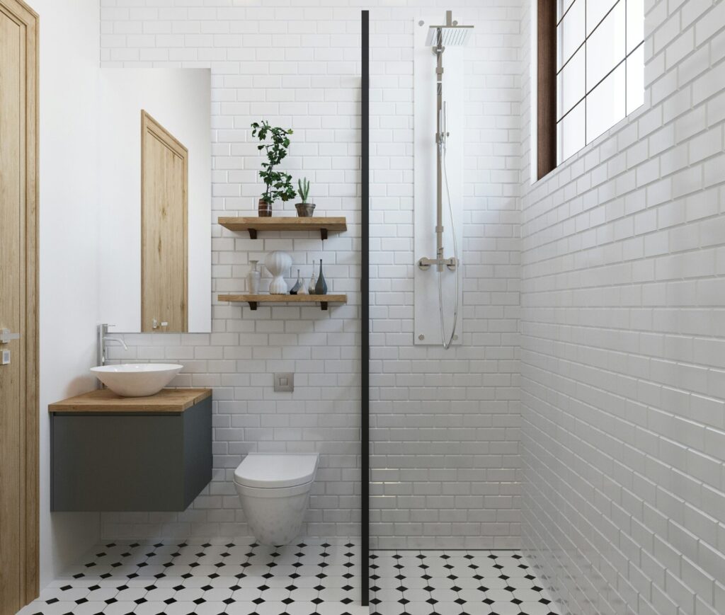 a bathroom with a shower and a sink