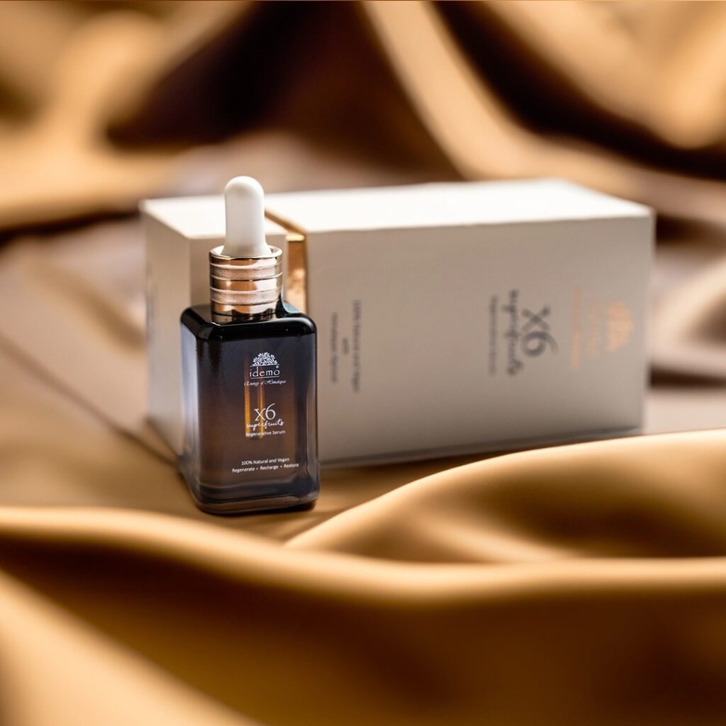 Elegant serum bottle on silk fabric