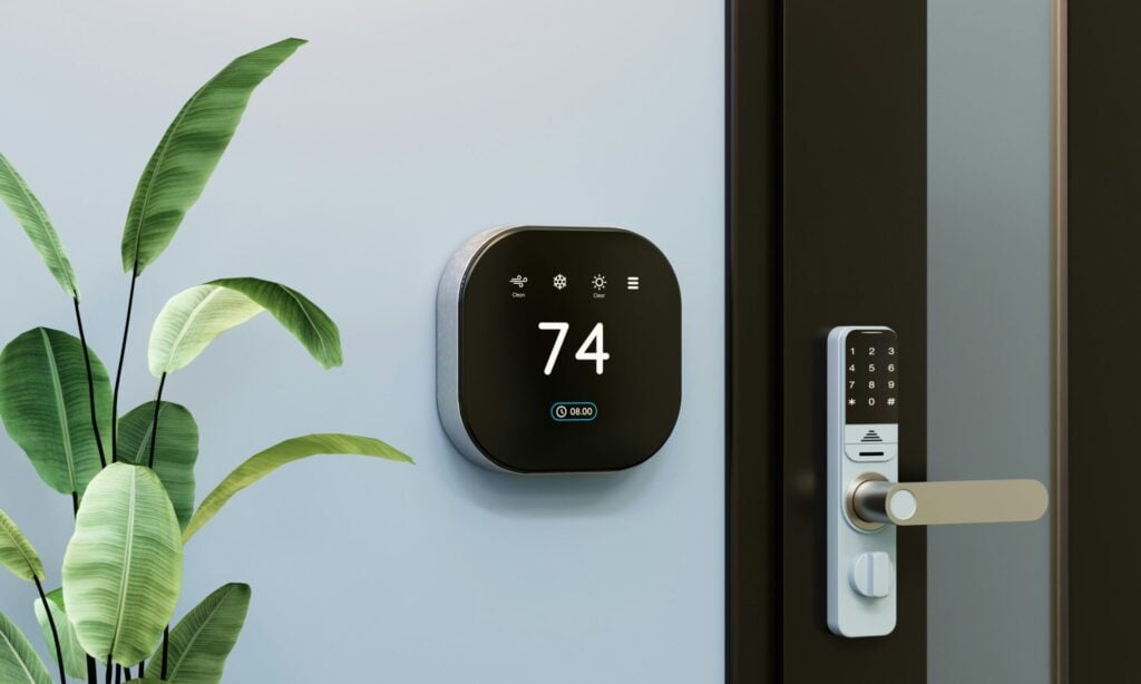 an electronic device on the wall of a smart home 