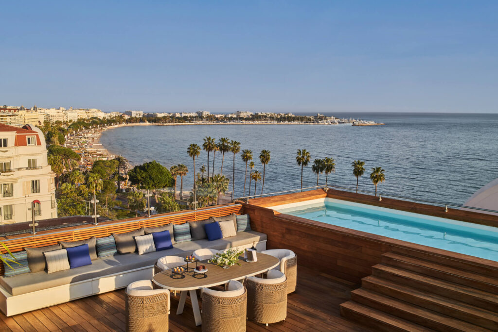 The Riviera suite at Hôtel Barrière Le Majestic with a pool giving out over Cannes' La Croisette