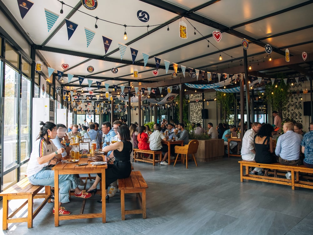 Guests celebrating Oktoberfest in a pub 
