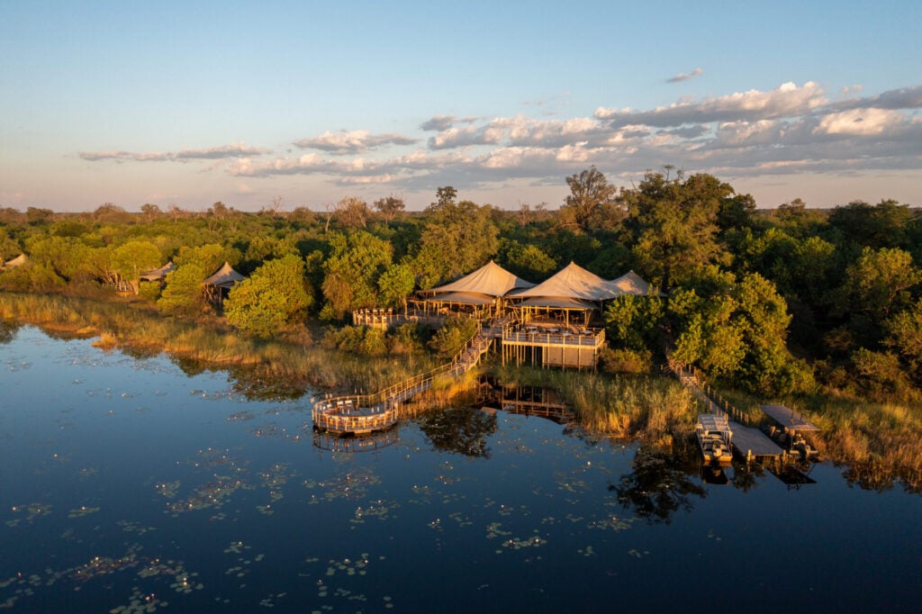 aerial view of wilderness camp on the waterside 
