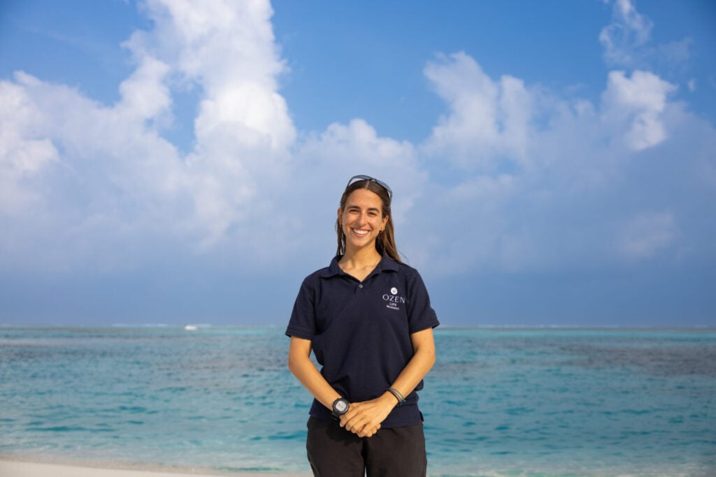 Person standing by the ocean.