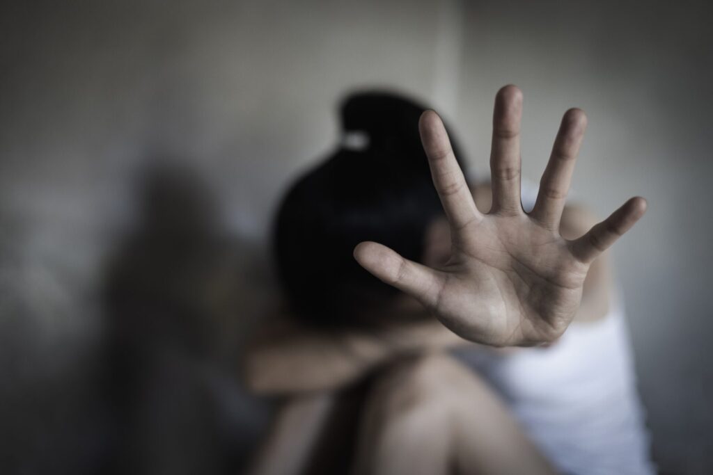 Person in distress, reaching for help.