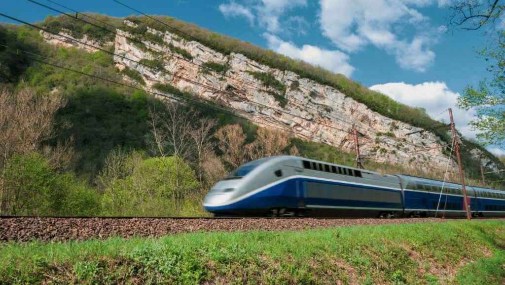 High-speed train passing through landscape