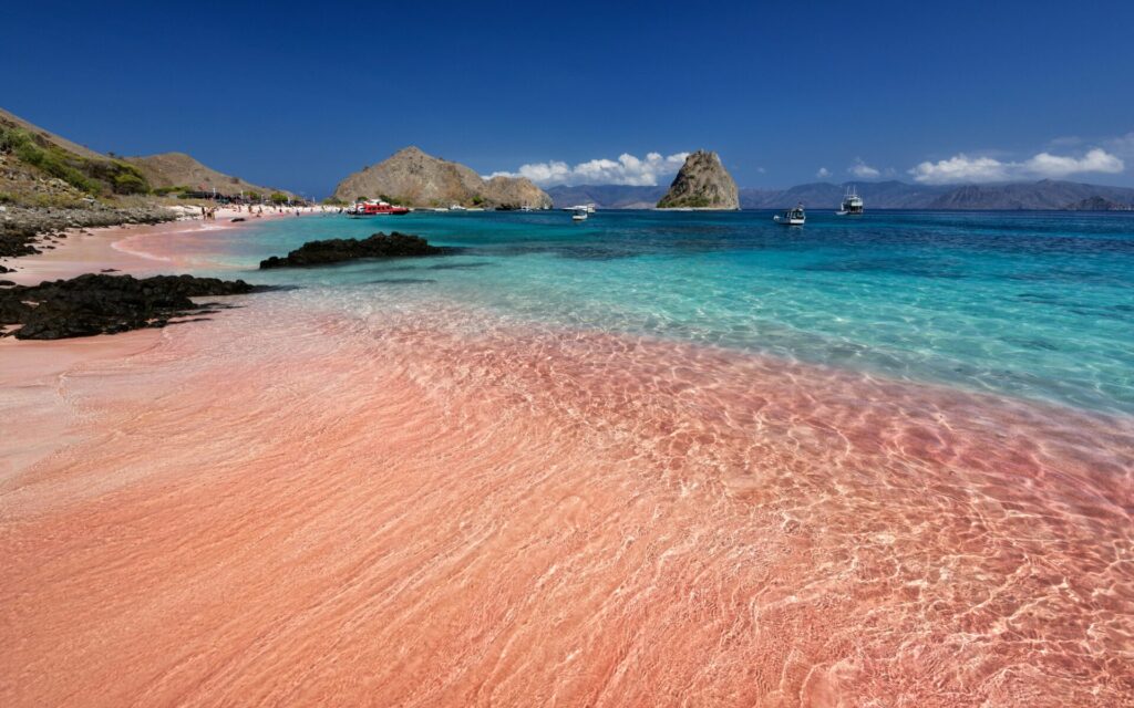 Turquoise water meets pink sandy beach in Sardinia