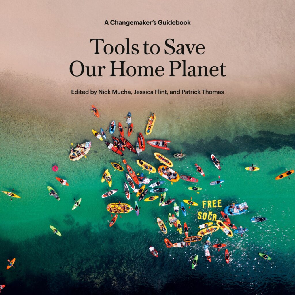 book cover with colourful kayaks on vibrant blue water